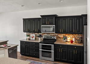 Kitchen counters with stainless steel appliances