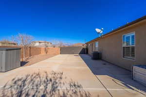 View of patio / terrace featuring a fenced backyard and cooling unit