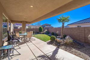 View of patio / terrace with outdoor dining space and a fenced backyard