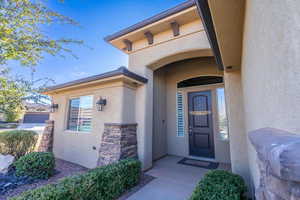 Property entrance with stucco siding