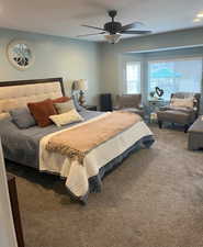 Bedroom featuring carpet floors and a ceiling fan