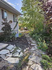 View of yard featuring fence