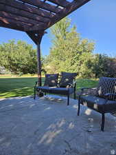 View of patio featuring a pergola