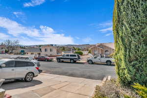 View of street featuring a residential view and a mountain view