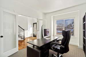 Office featuring light wood-type flooring and baseboards