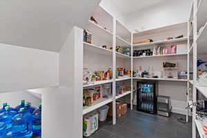 Pantry featuring beverage cooler