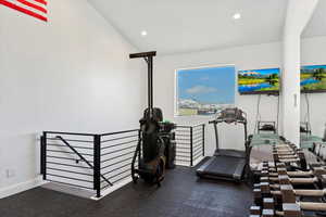 Workout room featuring recessed lighting and baseboards