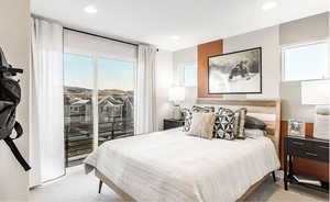 Bedroom featuring recessed lighting, light colored carpet, and access to exterior