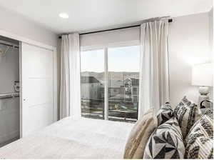 Bedroom with a closet and a mountain view