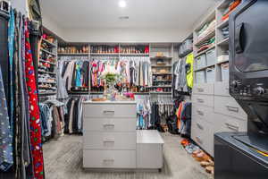 Walk in closet with visible vents