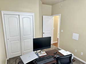 Office featuring carpet floors and baseboards