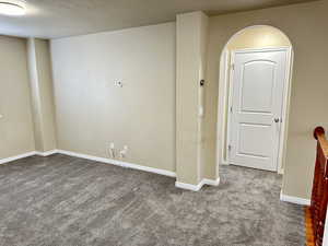 Spare room with carpet flooring and baseboards