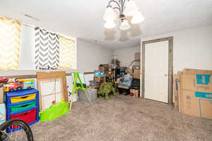 Family/Recreation room. Shows door to under the stairs storage.