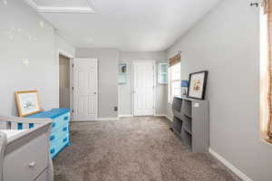 Bedroom 2 with closet door.