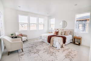 Bedroom with recessed lighting and baseboards