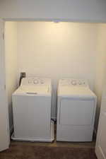 Laundry room featuring laundry area and washing machine and dryer