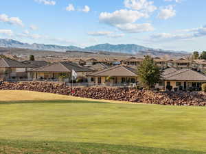 Property view of mountains with a residential view