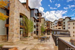 View of property's community featuring a patio area