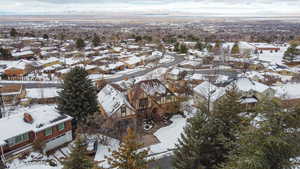 Snowy aerial view with a residential view