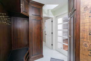 Mudroom with concrete flooring