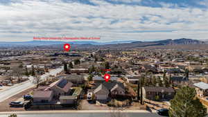 Drone / aerial view featuring a residential view and a mountain view