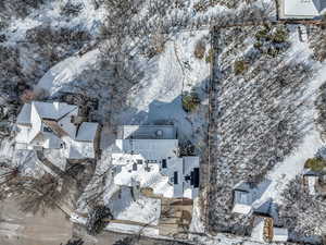 Snowy aerial view with a residential view