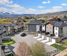 Exterior space featuring a mountain view and a garage