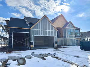 View of front of home with an attached garage