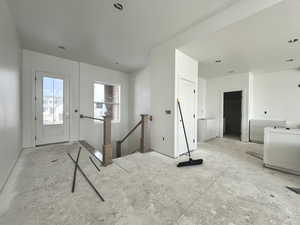 Entrance foyer featuring a textured ceiling