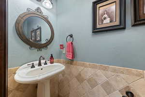 Bathroom with a textured wall