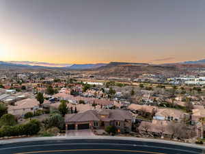 Birds eye view of property featuring a mountain view and a residential view