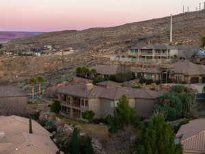 Aerial view at dusk with a residential view and a mountain view