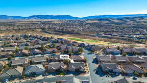 Aerial view featuring a residential view and a mountain view