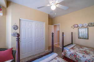 2nd Bedroom with a ceiling fan, carpet, a closet, and baseboards