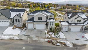 View of front of property with a residential view and a mountain view