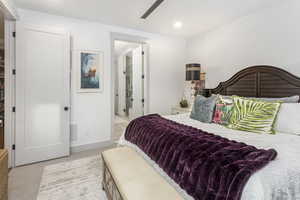 Bedroom with light carpet, baseboards, visible vents, a ceiling fan, and recessed lighting