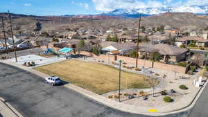 Birds eye view of property with a residential view and a mountain view