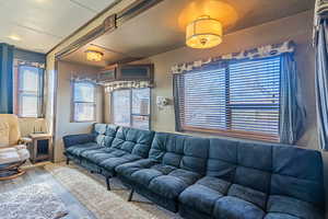 Living area with wood finished floors