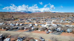 Aerial view featuring a residential view and a mountain view