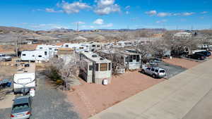 Birds eye view of property with a residential view and a mountain view