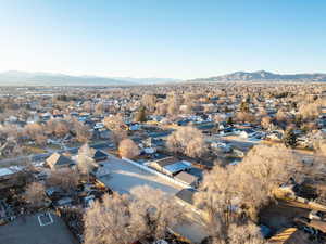 Drone / aerial view with a residential view and a mountain view