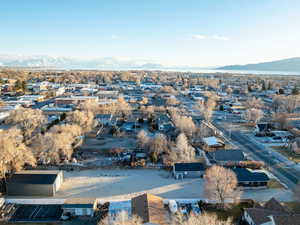 Birds eye view of property with a residential view and a mountain view