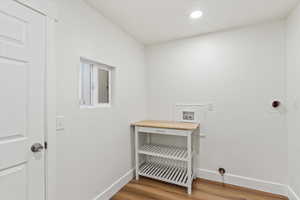 Laundry room and access to garage.