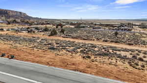 Property view of mountains with a residential view