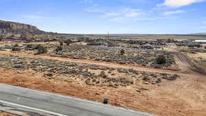 Property view of mountains with a residential view