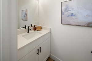 Bathroom with baseboards and vanity