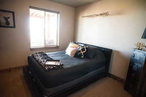 Bedroom with baseboards