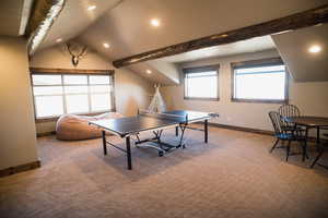 Playroom with vaulted ceiling with beams, recessed lighting, carpet, and baseboards