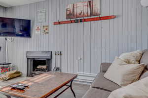 Living area with wood finished floors