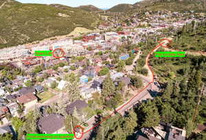 Birds eye view of property with a mountain view